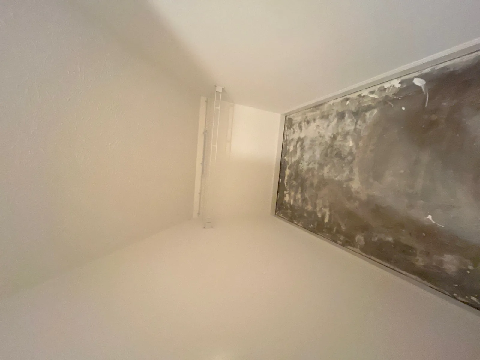 Room under construction showing a partially plastered ceiling edge — serving Dallas, GA.