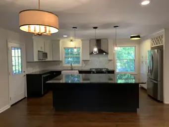 Kitchen remodel with two-tone shaker cabinets, hexagon marble backsplash, and full-wall garden windows — Metro Atlanta, GA