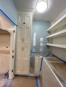 Pantry cabinet installation — white shaker cabinets with gold hardware, open shelving built-in during kitchen renovation — Powder Springs, GA