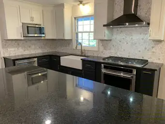 Kitchen renovation with gloss black ceiling, two-tone shaker cabinets, and hexagon marble tile backsplash — Metro Atlanta, GA